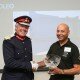 (l-r) Sir Timothy Cox, Lord Lieutenant of Warwickshire presents Sul Sahota, Chairman of T A Savery & Co, with the Queen’s Award for International Trade