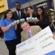 Ray Nash of Alzheimer’s Society celebrates £12,700 charity total with staff at Scrivens branch at Corporation Street, Birmingham. (from left marketing assistant Upkarpreet Hothi, Assan Drammeh (assistant branch manager), Yvette Sidhu (contact lens optician) and Simrun Deol (sales advisor).