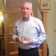 Bill Graham, Chairman of Alloy Wire International, with his Top 100 award from the Manufacturer