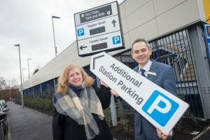 Cllr Kath Hartley and London Midland’s Dave Whitley point commuters to extra Park & Ride space at Four Oaks.